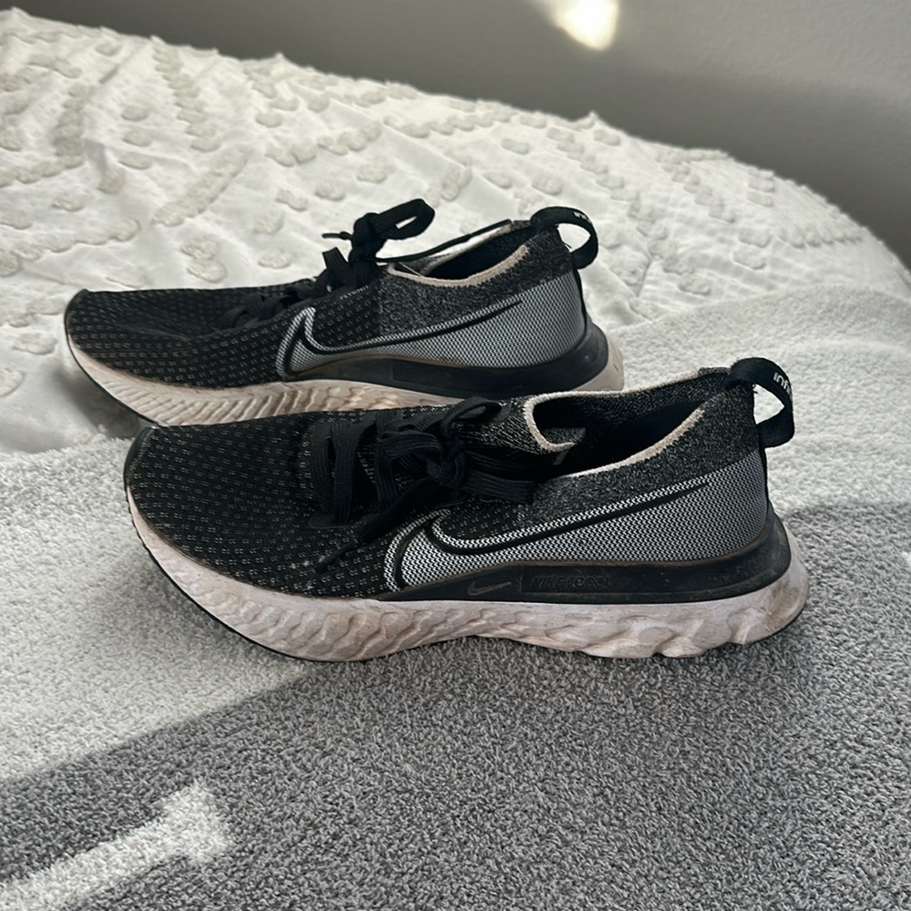 Black Nike running shoes